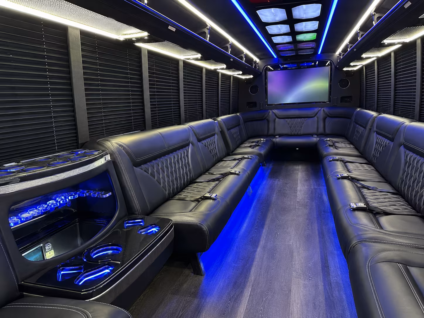 utica 20 passenger party bus inside