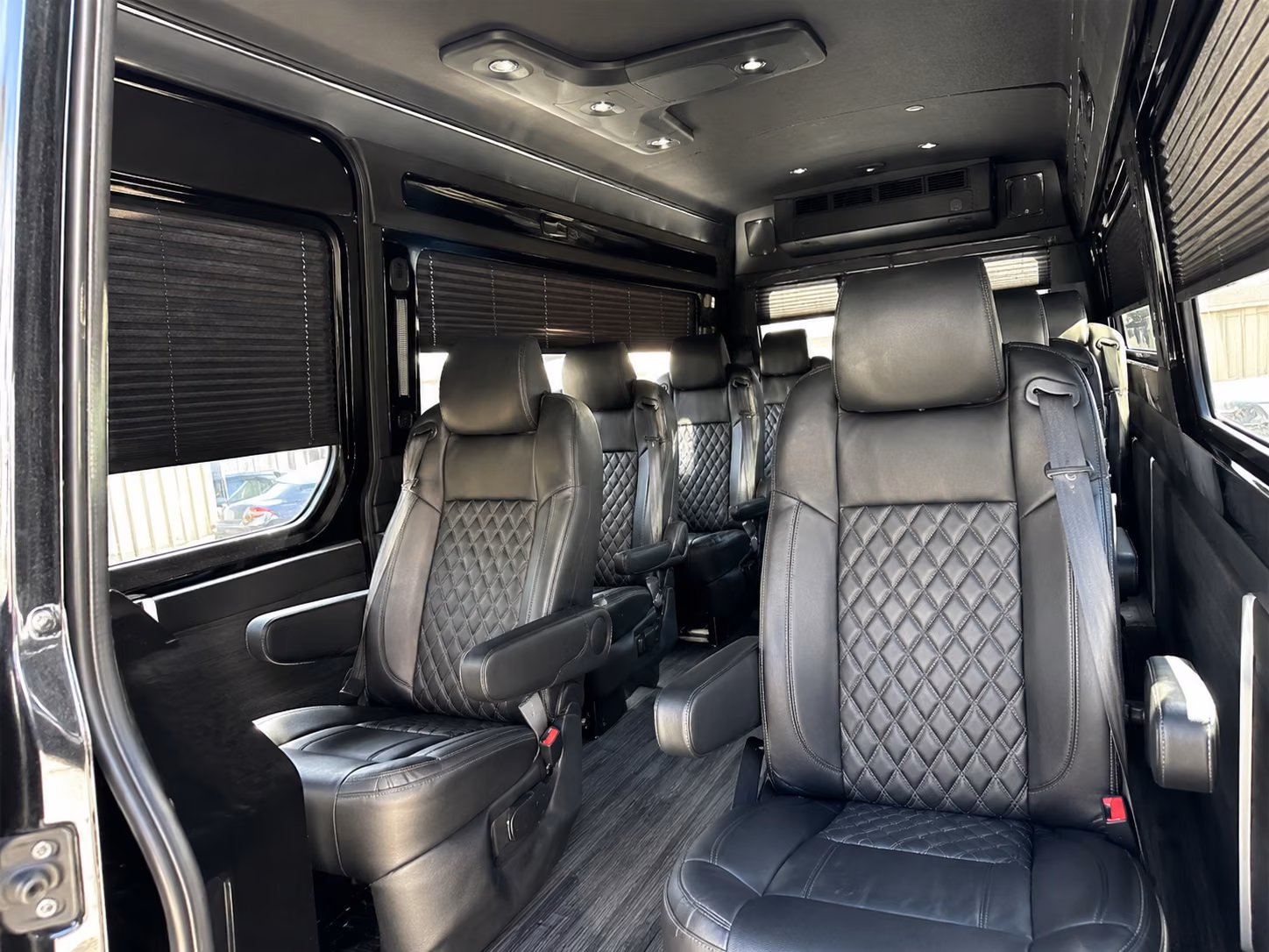 utica sprinter van with driver inside